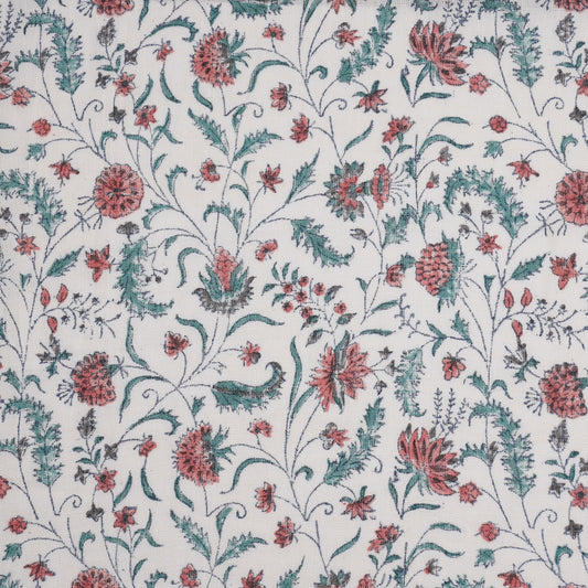 Create a cozy retreat with cottage-style decor and hand-printed fabrics, a blend of comfort and style.