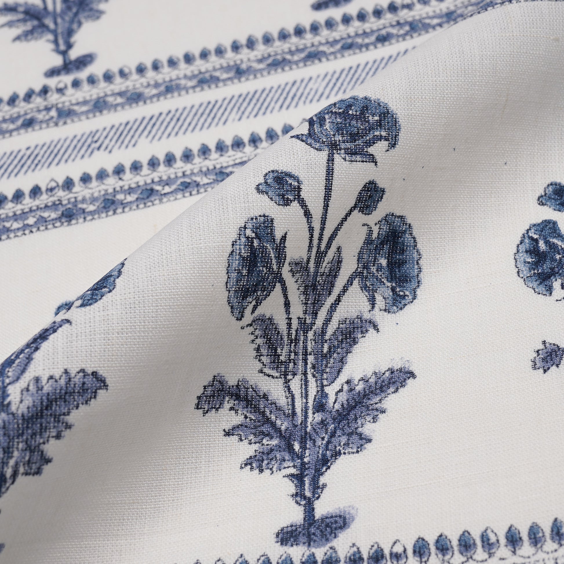 Create a cozy retreat with cottage-style decor and bespoke upholstery for a personal touch